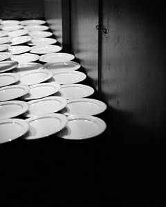 rows-of-empty-plates-ron-koeberer